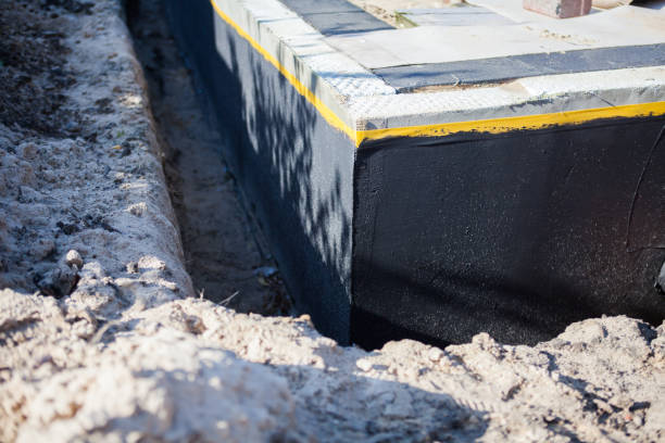 Professional Waterproofing technician working in Fairview, NY